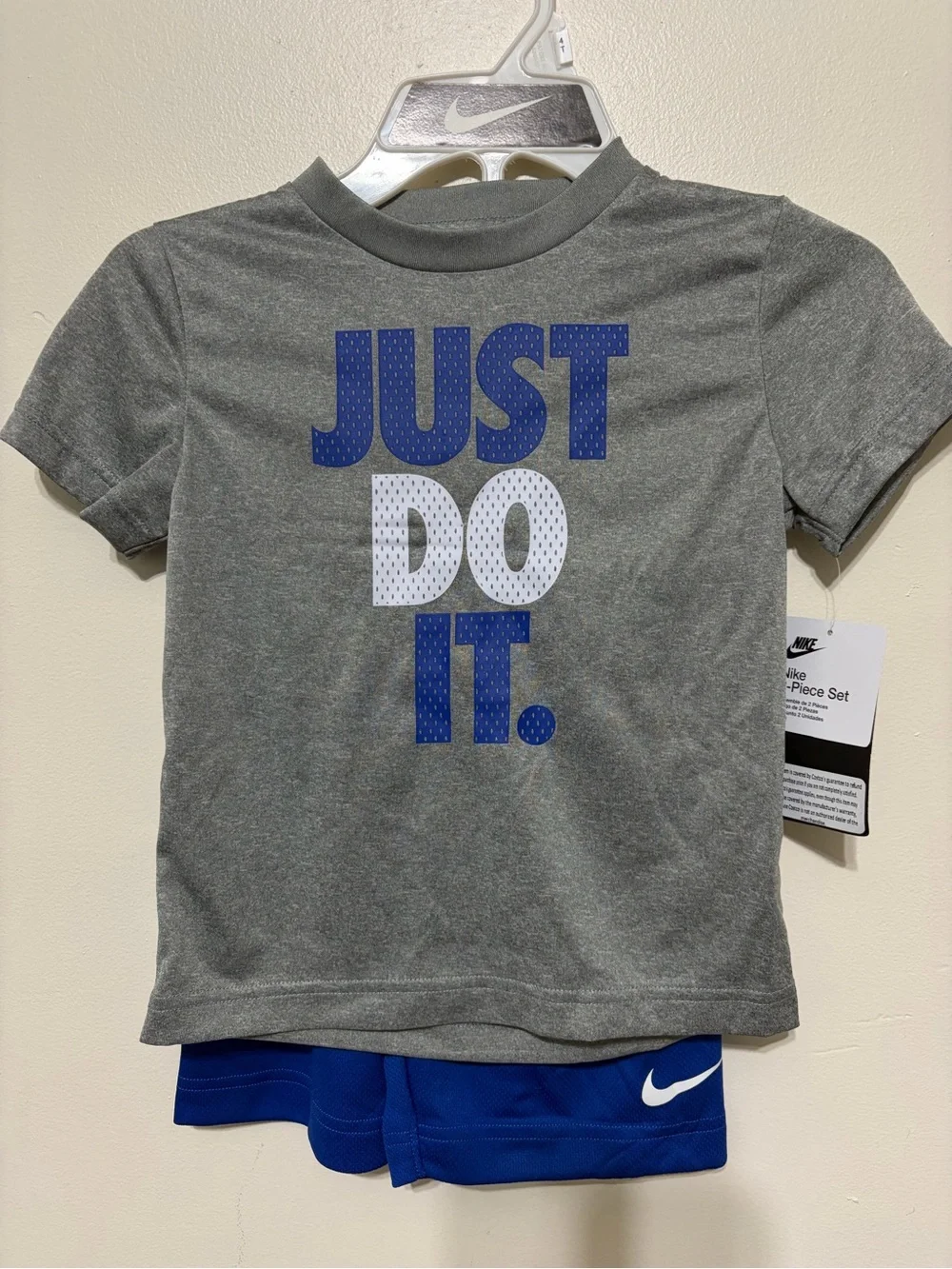Nike Kids Short Sleeve Tee in Gray with Blue & White Graphic
